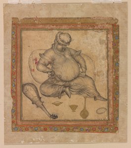 Drunk European seated on ground